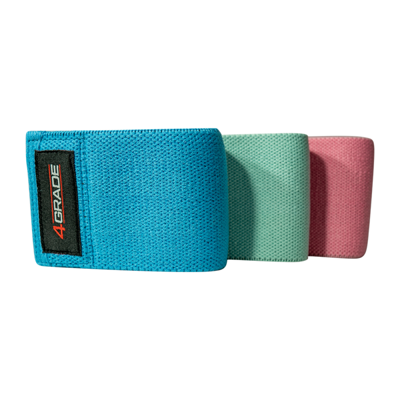 Zestaw trzech materiałowych gum oporowych Hip Band 4Grade różowa, niebieska, zielona z boku